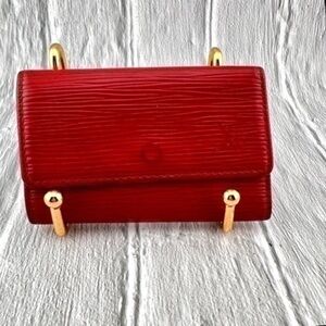 AUTHENTIC Louis Vuitton key holder. Color: Castilian Red.